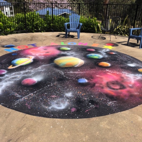 Floor mural with young people's DOA art therapy group